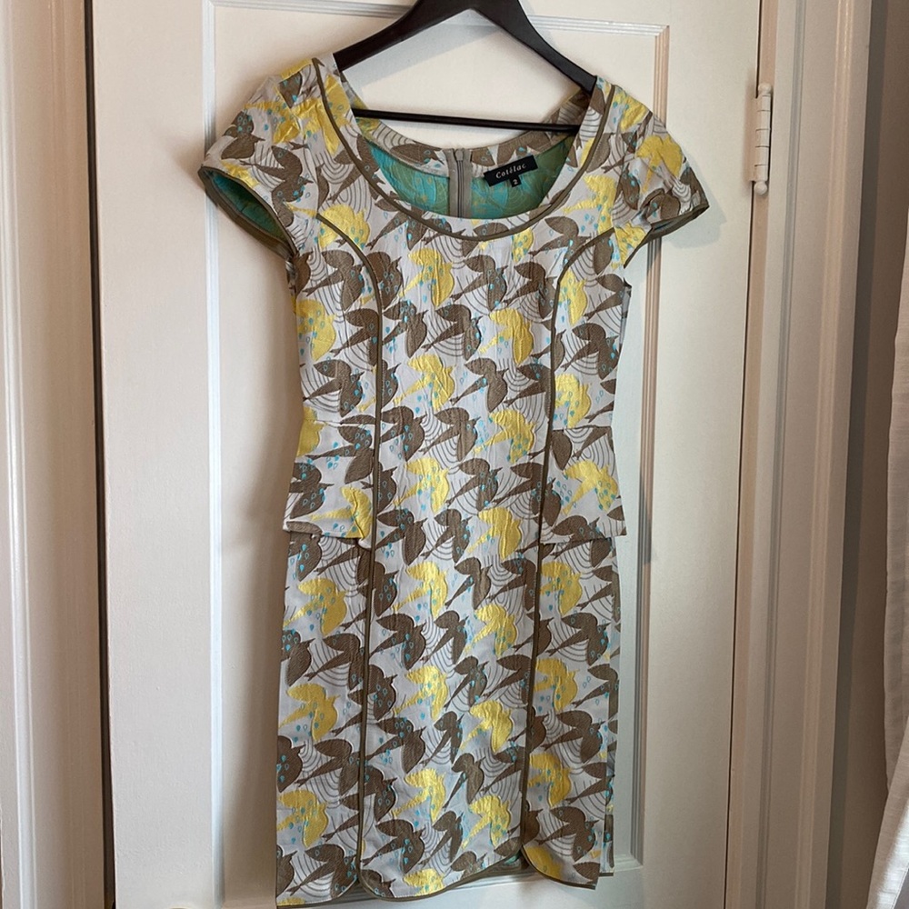 Gorgeous Cotélac dress size 2 with peplum and bird print